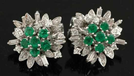 Appraisal: A pair of emerald and diamond earrings Of floral cluster