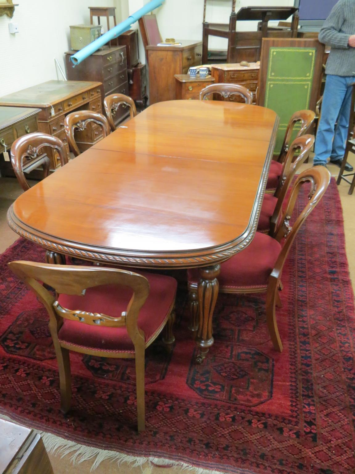 Appraisal: A good Victorian-style mahogany dining room set D-end table with