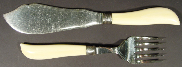 Appraisal: Silver-plated fish slice and fork with ivory handles and silver