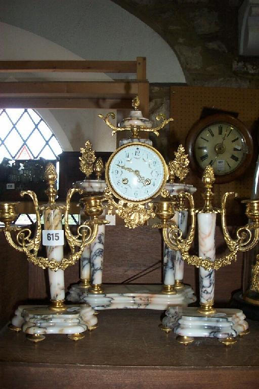 Appraisal: A th century French clock garniture with polished marble framework