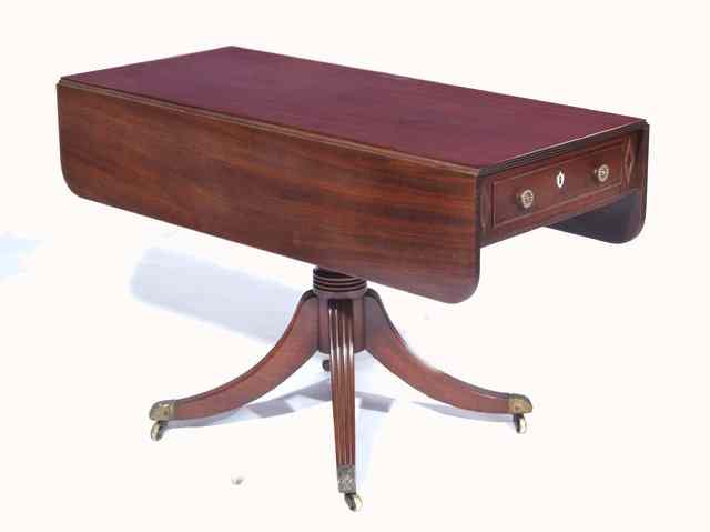 Appraisal: A REGENCY RECTANGULAR MAHOGANY PEMBROKE TABLE the top with a