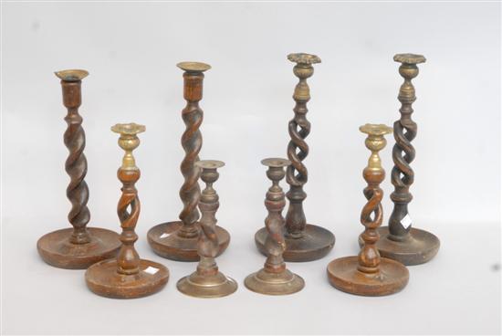 Appraisal: GROUP ANTIQUE CARVED TURNED WOOD CANDLESTICKS Four pairs barley twist