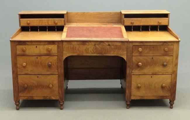 Appraisal: Victorian kneehole desk having multi-drawers and cubby holes and leather