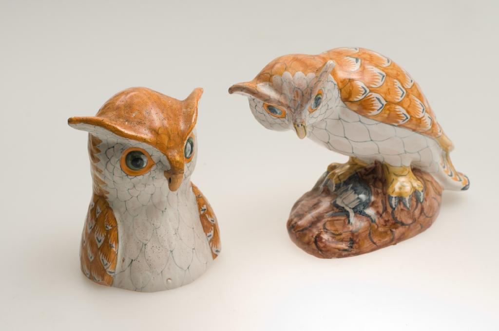 Appraisal: HENRIOT QUIMPER MODEL OF AN OWL modelled perched upon a