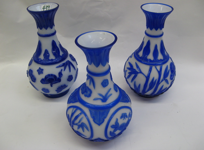 Appraisal: THREE CHINESE PEKING CAMEO GLASS VASES in similar patterns of