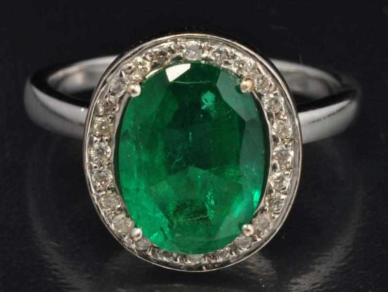 Appraisal: K W Gold Diamond Emerald Ring Description Diamonds ctw Emerald