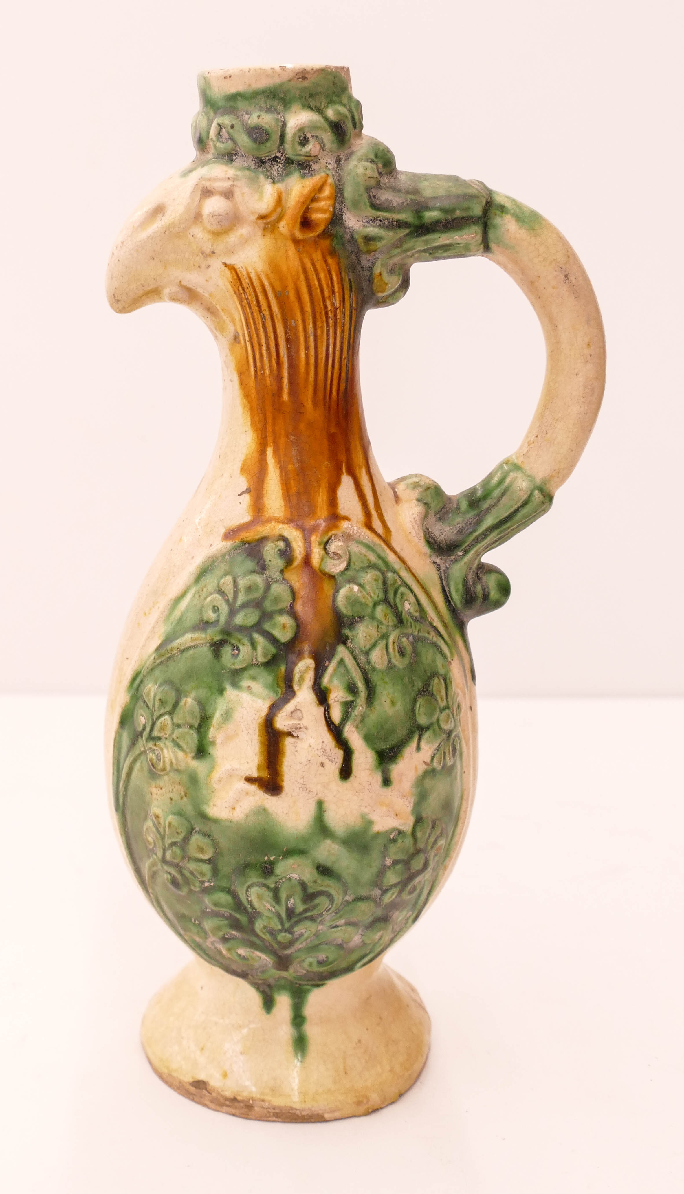 Appraisal: Chinese Sancai Phoenix Ewer ''x '' Three color lead glazed