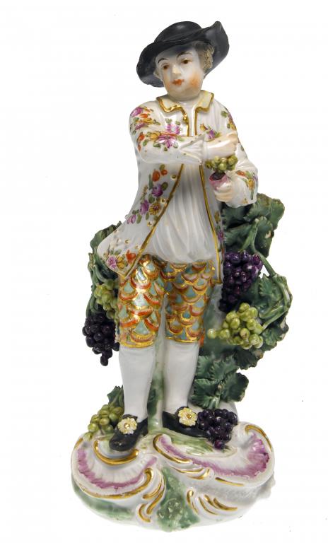 Appraisal: A DERBY FIGURE OF A GRAPE HARVESTER possibly emblematic of