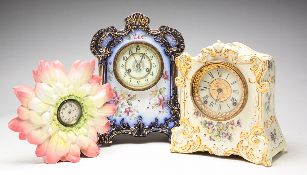 Appraisal: THREE CHINA CASED CLOCKS Ca European cases and American movements