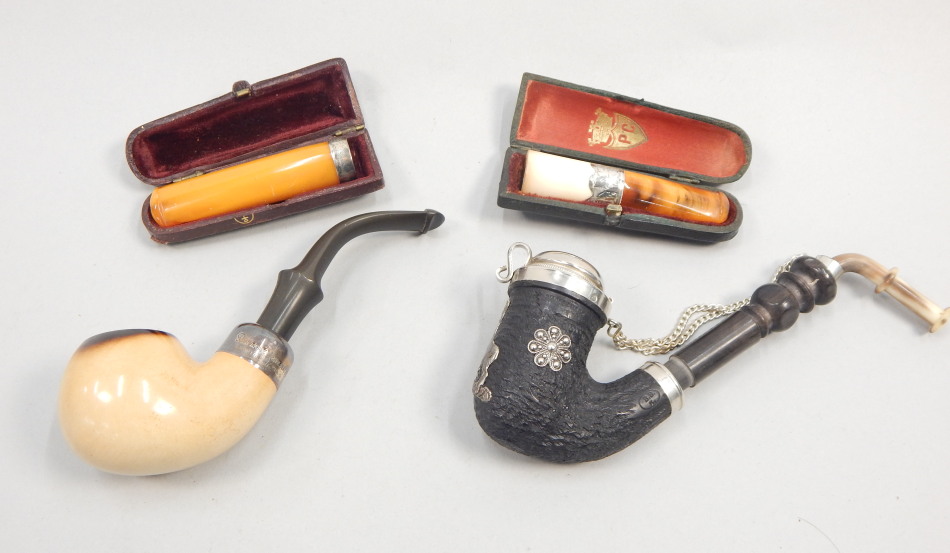 Appraisal: Various smoking related items to include two pipes and two