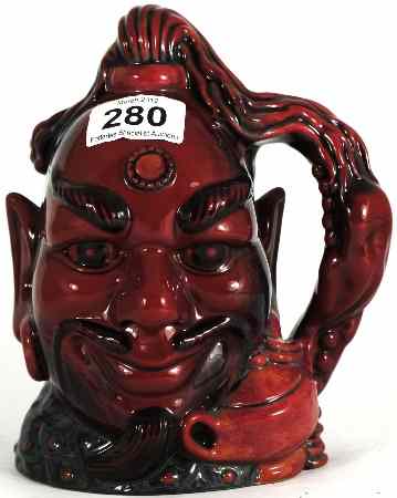 Appraisal: Royal Doulton Large Flambe Character Jug Aladdins Genie D Limited