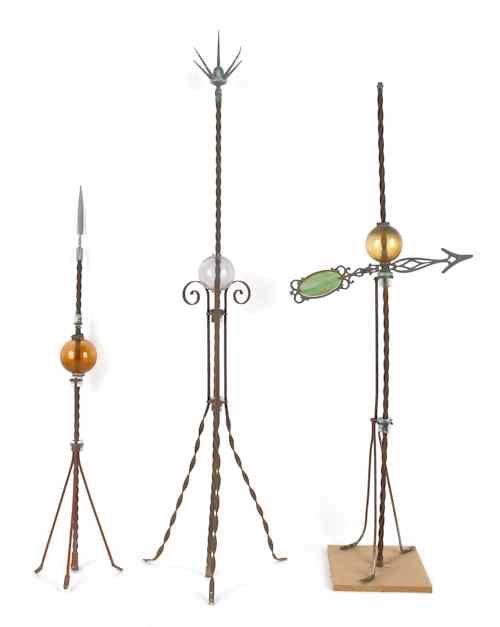 Appraisal: Three iron lightning rods th c