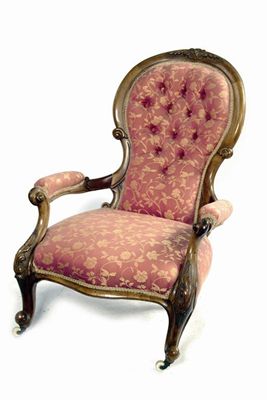 Appraisal: A Victorian carved walnut show frame open armchair with a