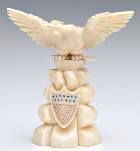 Appraisal: E PLURIBUS UNUM IVORY Carved figure of an eagle perched