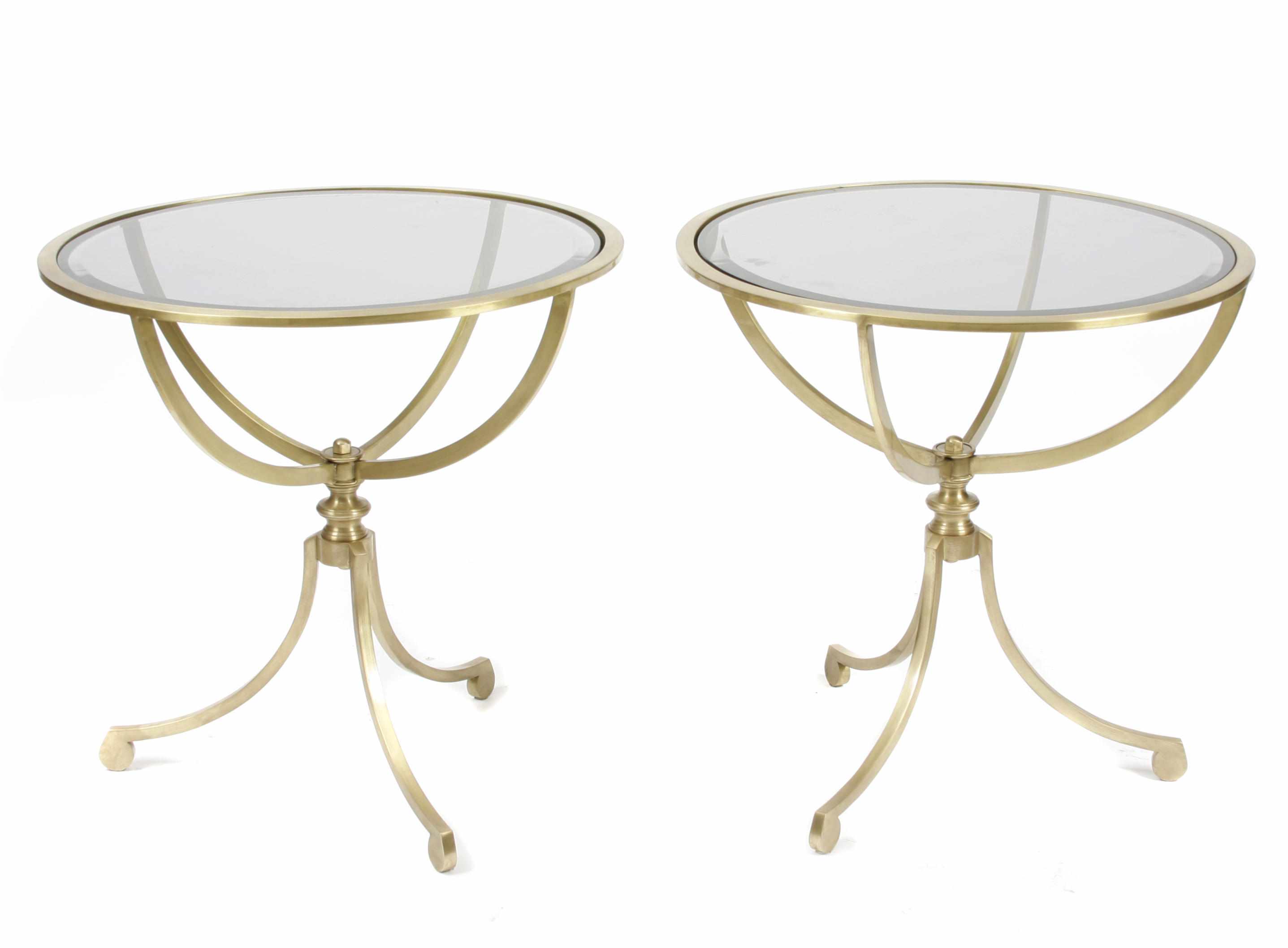 Appraisal: A pair of Neoclassical style brass and glass tables height