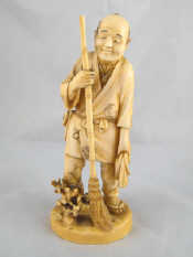 Appraisal: A Chinese circa 's ivory figure of a peasant with