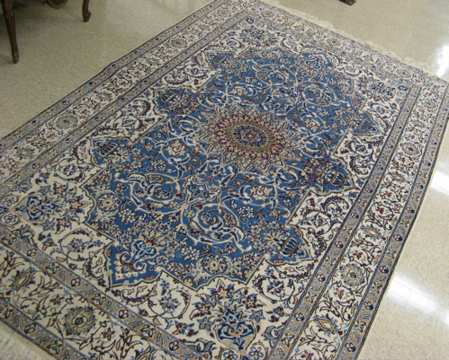 Appraisal: PERSIAN NAIN CARPET central Iran central rosette medallion with surrounding