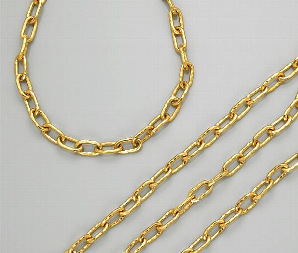 Appraisal: Two twenty-two karat gold chains Jean Mahie signed JM one