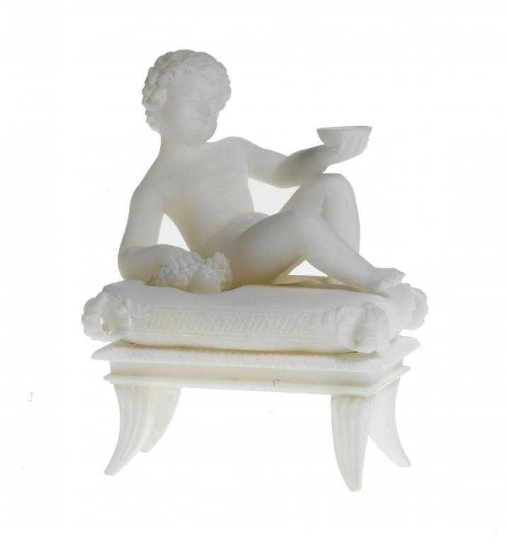 Appraisal: AN INTERESTING CARVED ALABASTER MINIATURE STATUETTE OF THE INFANT BACCHUS