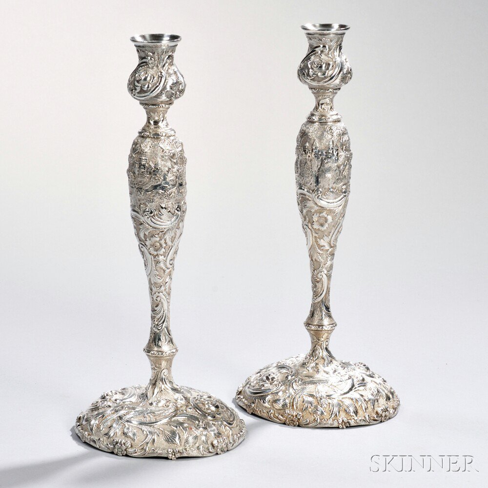 Appraisal: Pair of Sterling Silver Repousse-decorated Candlesticks probably Baltimore c most