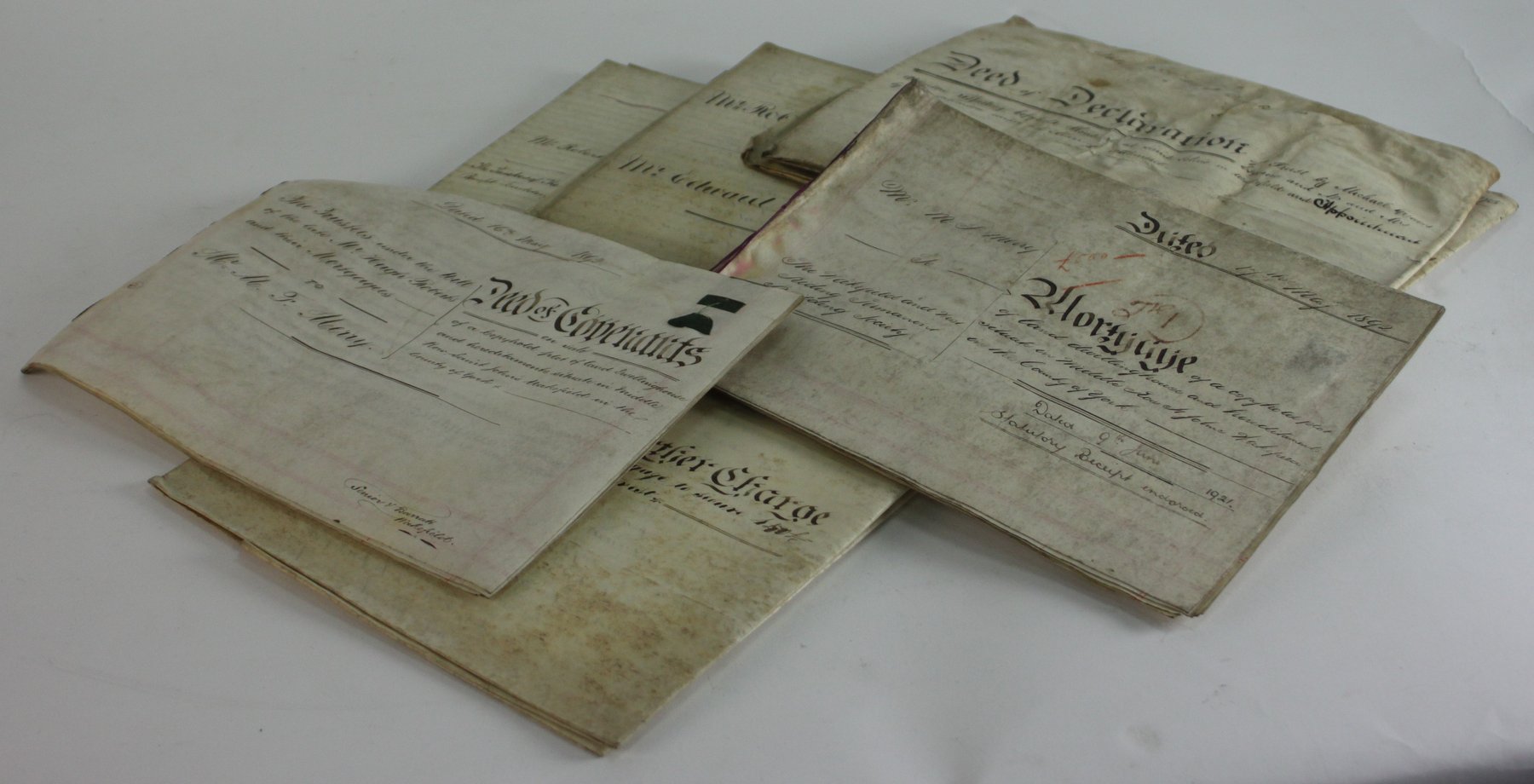 Appraisal: Ten th Century indentures mainly relating to property in the