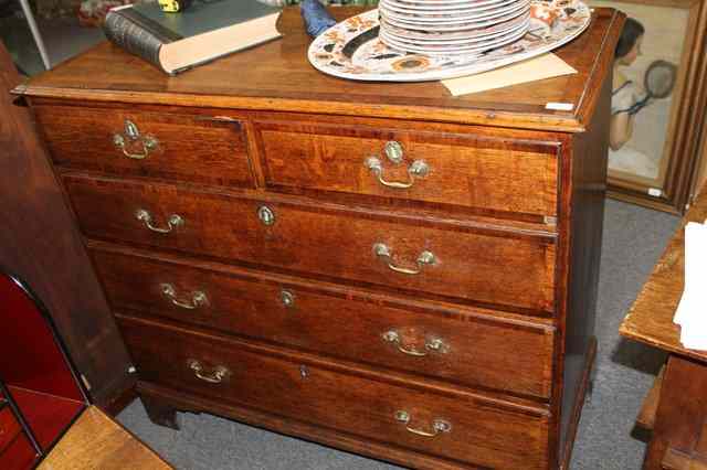 Appraisal: A TH CENTURY OAK AND MAHOGANY CROSSBANDED STRAIGHT FRONT CHEST