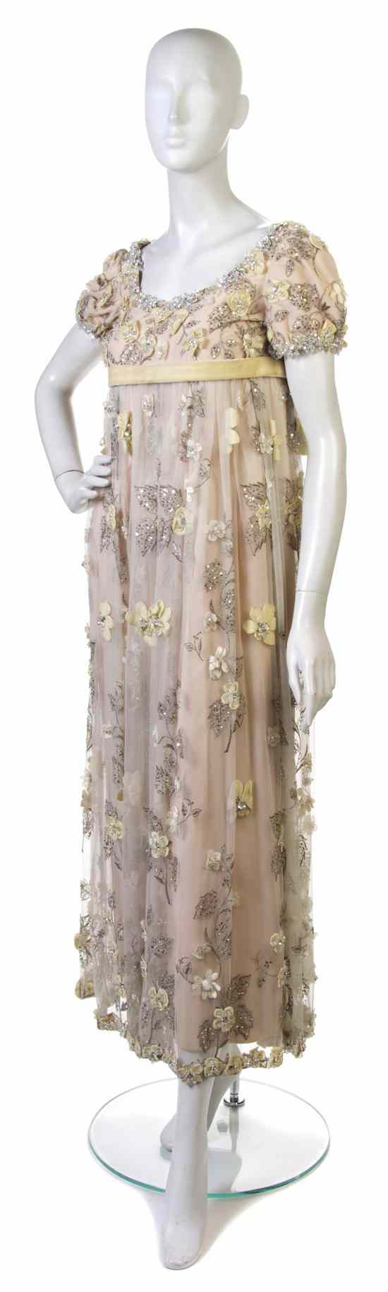 Appraisal: A George Halley Off-White Tulle Evening Gown with all-over crystals