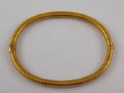 Appraisal: A Russian hallmarked standard gold approx carat bangle of coiled