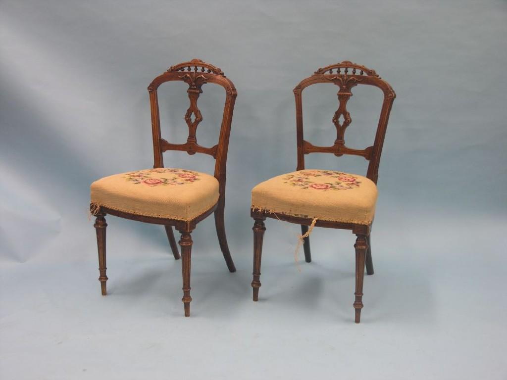 Appraisal: A set of six late Victorian walnut dining chairs with