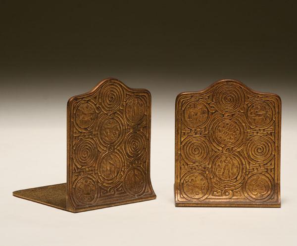 Appraisal: Pair of Tiffany gilt bronze zodiac bookends Marked Tiffany Studios