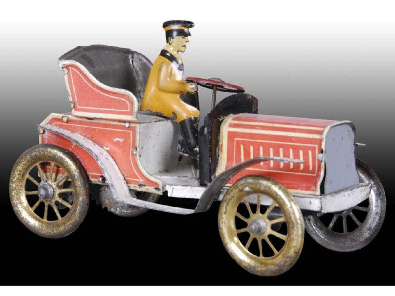 Appraisal: German Tin Wind-Up Toy Automobile with Driver Description '' L