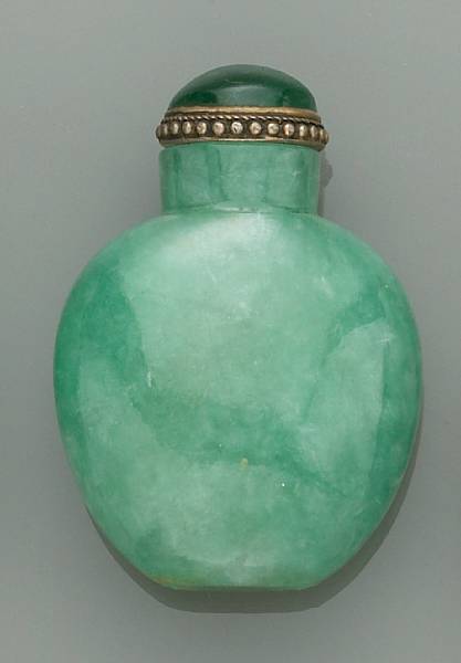 Appraisal: A good green jade snuff bottle The simple profile of