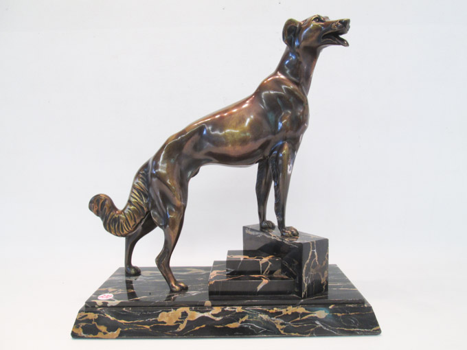 Appraisal: CAST BRONZE SCULPTURE AFTER LOUIS CARVIN of a standing dog