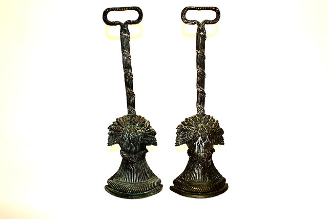 Appraisal: A PAIR OF VICTORIAN DOORSTOP'S in the form of wheat