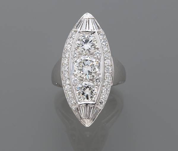 Appraisal: A diamond ring centering a round brilliant-cut diamond principal diamond