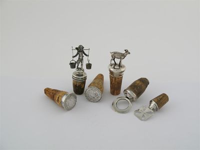 Appraisal: Six various mounted bottle corks