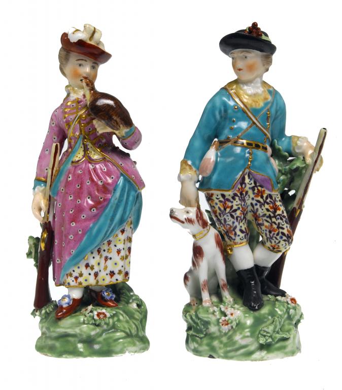 Appraisal: A PAIR OF DERBY FIGURES OF A SPORTSMAN AND COMPANION