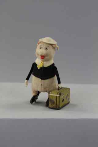 Appraisal: SCHUCO PIG CARRYING SUITCASE Germany c scarce example depicted in