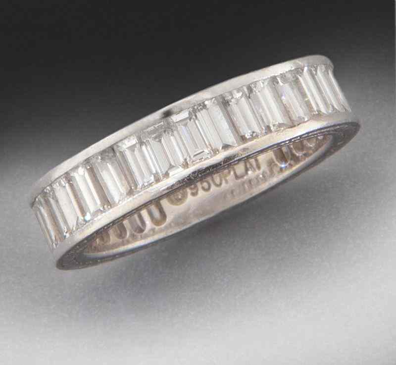 Appraisal: Ladies platinum and diamond eternity bandmounted with baguette diamonds cts