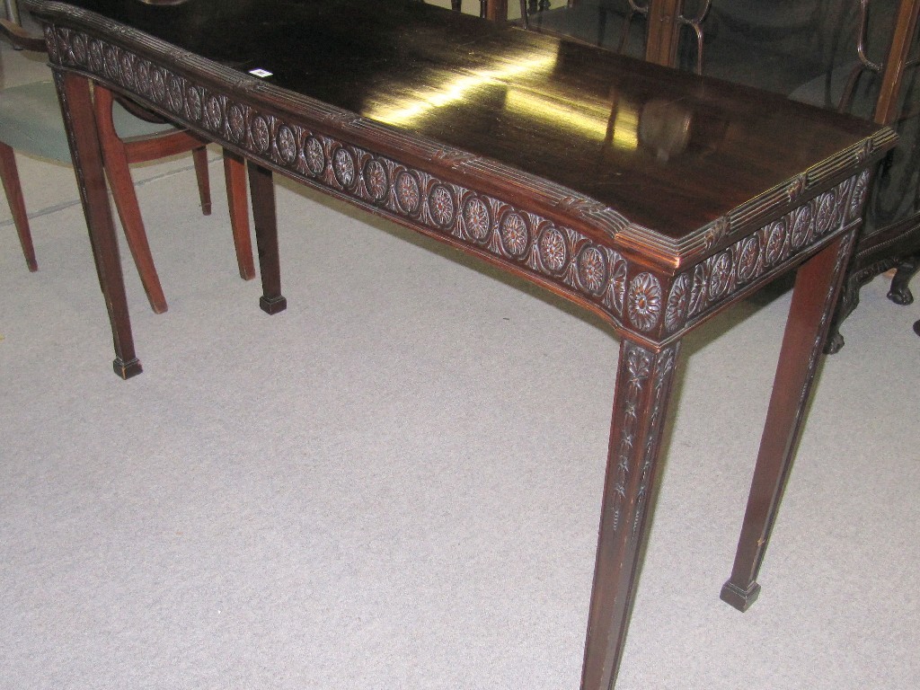 Appraisal: Mahogany serpentine front serving table on square tapered supports