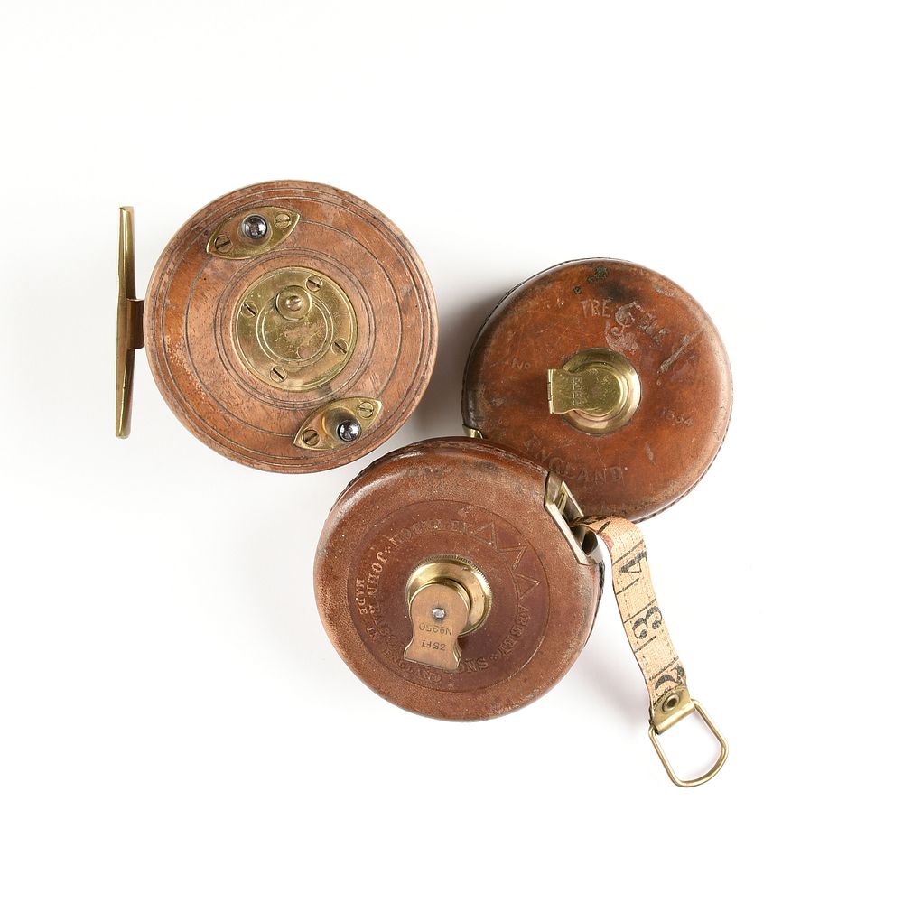 Appraisal: A GROUP OF TWO VINTAGE ENGLISH TAPE MEASURES AND ONE