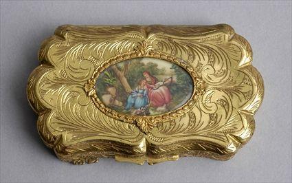 Appraisal: CONTINENTAL GOLD-FILLED COSMETIC BOX WITH MINATURE INSET The oblong scalloped