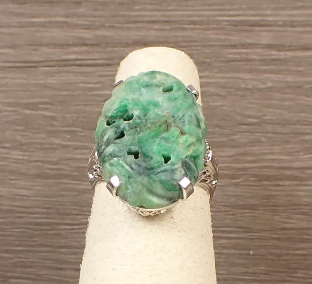 Appraisal: GREEN HARDSTONE AND WHITE GOLD FILIGREE RING The k white