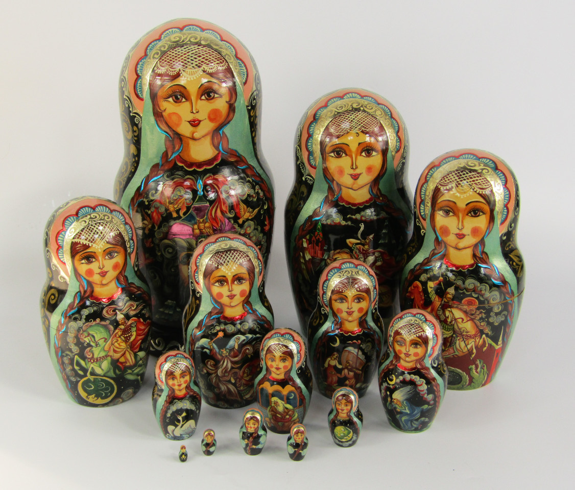 Appraisal: Russian painted wooden dolls painted with a damsel and knight