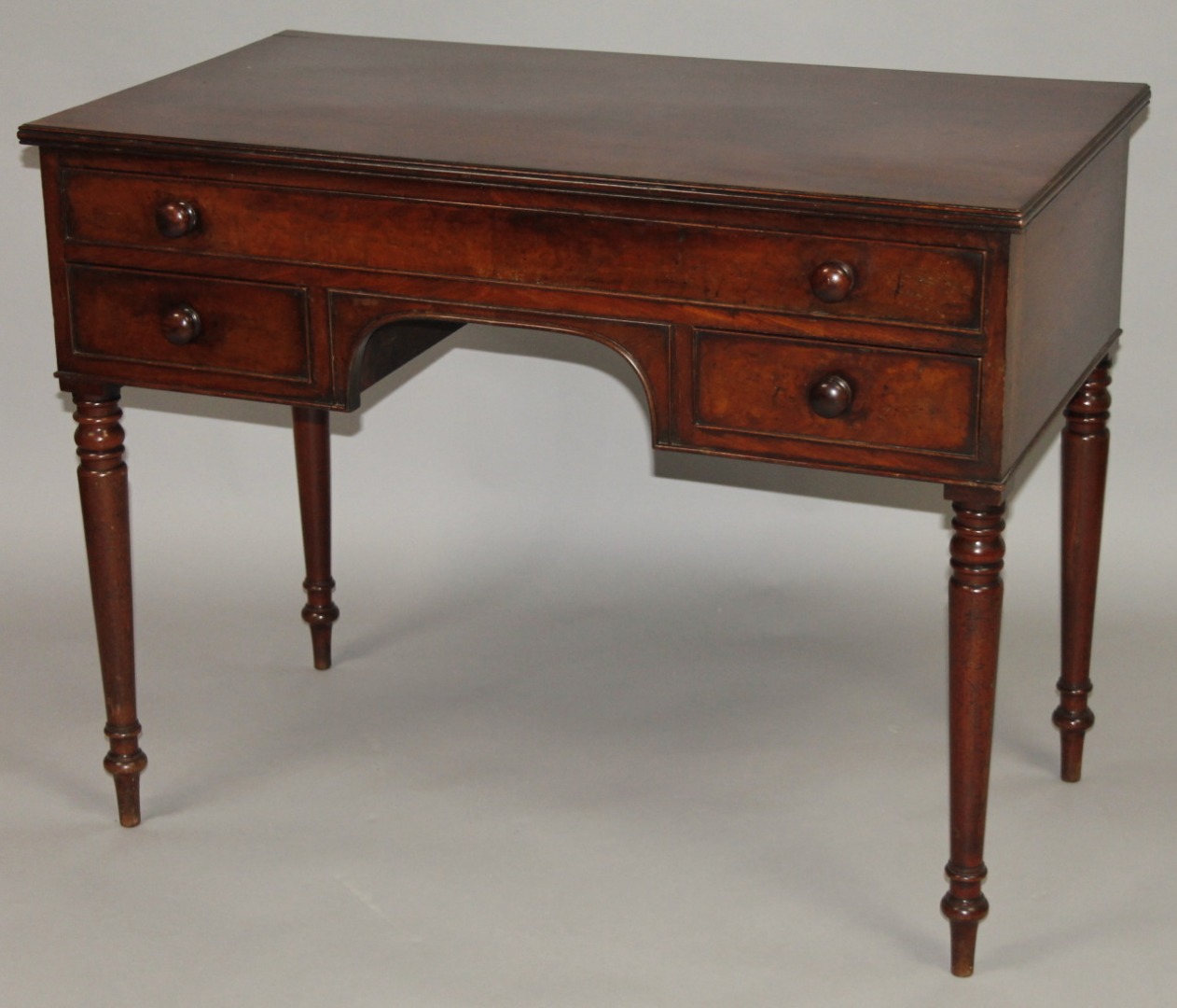 Appraisal: An early thC mahogany dressing table the rectangular moulded top