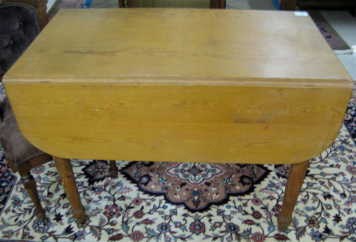 Appraisal: PINE DROP-LEAF DINING TABLE American c having a rectangular top