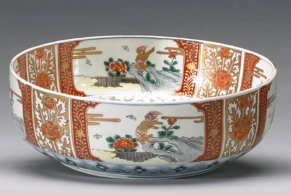 Appraisal: A set of three Imari porcelain bowls th Century Of