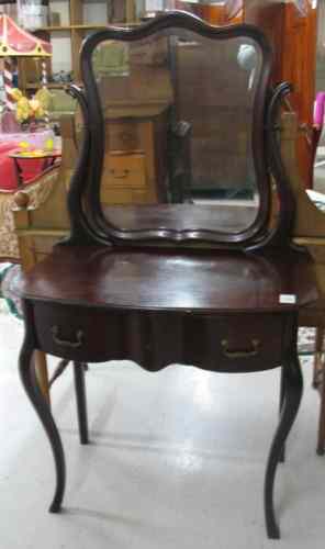 Appraisal: MAHOGANY DRESSING TABLE WITH MIRROR American c having a serpentine-shaped