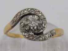 Appraisal: A yellow metal tests carat gold diamond crossover ring