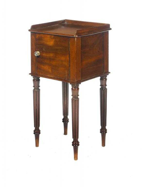 Appraisal: A GEORGE IV MAHOGANY POT CUPBOARD the galleried top on